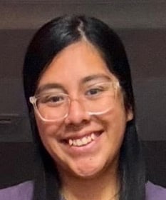 Closeup of Keily Pineda wearing glasses.